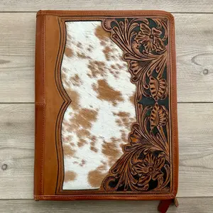 Cowhide and tooled leather portfolio organizer Cowhide and tooled leather portfolio organizer