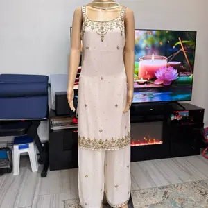 Sleeveless Georgette Plazoo Suit in Vibrant Olive Green with Embellished Hem and Matching Skirt