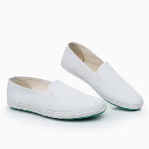 Extra comfy slip-on white canvas shoes with wide roomy toe box to avoid squeezing feet, soft layered sole eases foot fatigue, breathable material cuts sweating, anti-slip green bottom ideal for elders for daily strolls and household chores.