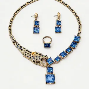 Women’s jewelry set featuring European and American design—necklace, ear drops, and ring—with a leopard head motif and geometric patchwork, elegant and niche style.