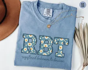 RBT Daisy Shirt, Comfort Colors Registered Behavior Technician Tshirt, ABA Therapist Gift, Floral Behavior Analyst Graduation Graphic Tees