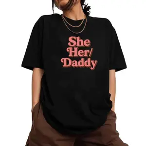 T-shirt Showcasing "She Her/ Daddy" Statement in Red with Distinctive Line-Break Composition