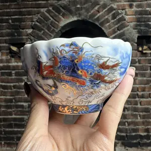 Blue Dragon Artisan Porcelain Tea Bowl with Gold Accents and Scalloped Edge - Elegant Porcelain Tableware for Tea Lovers and Special Occasions