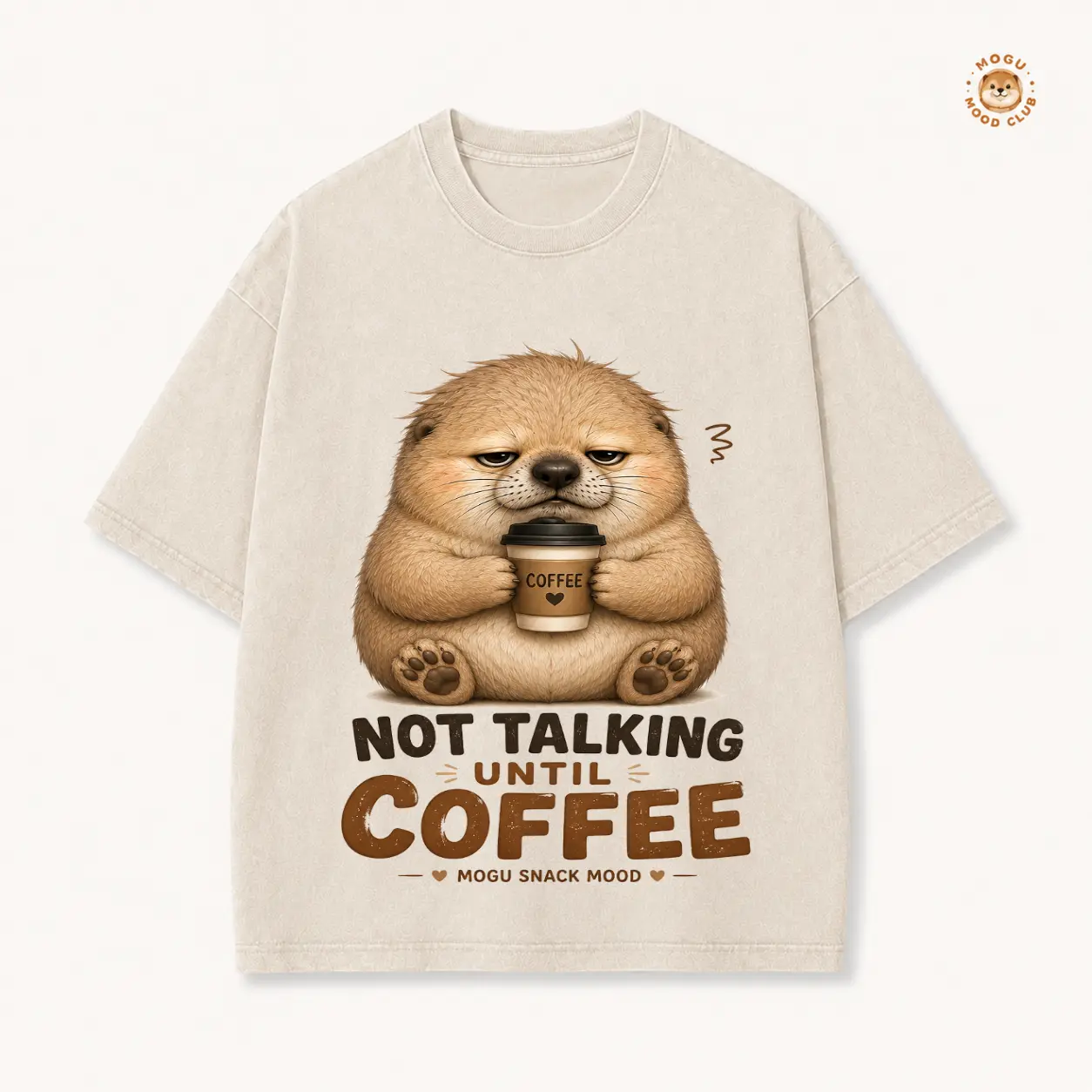 Oversized graphic t-shirt with sleepy otter holding coffee, 'NOT TALKING UNTIL COFFEE MOGU SNACK MOOD.' print, casual short sleeve top for coffee lovers, funny morning mood design