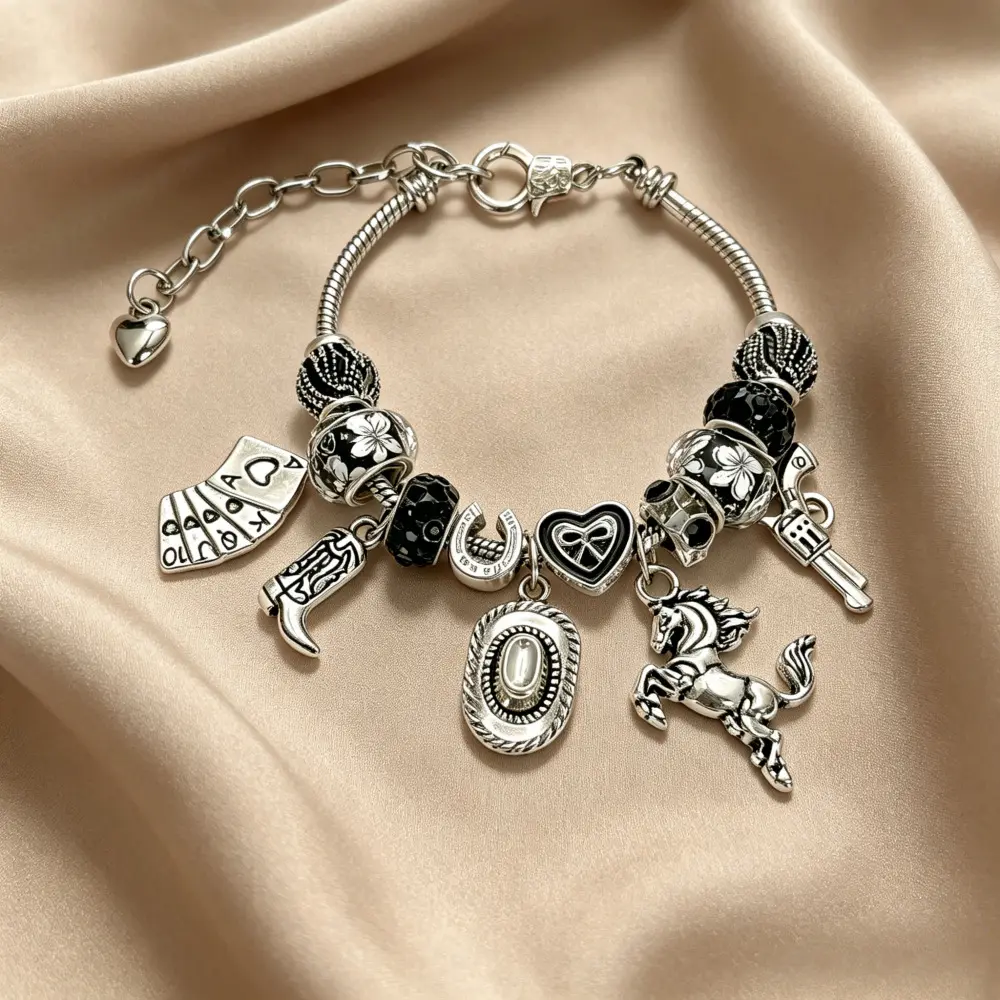 Western Cowboy-Themed Charm Bracelet, vintage silver snake-chain bracelet featuring horse, cowboy hat, cowboy boots, gun, and playing card charms, with black crystal beads; adjustable length; makes a great gift