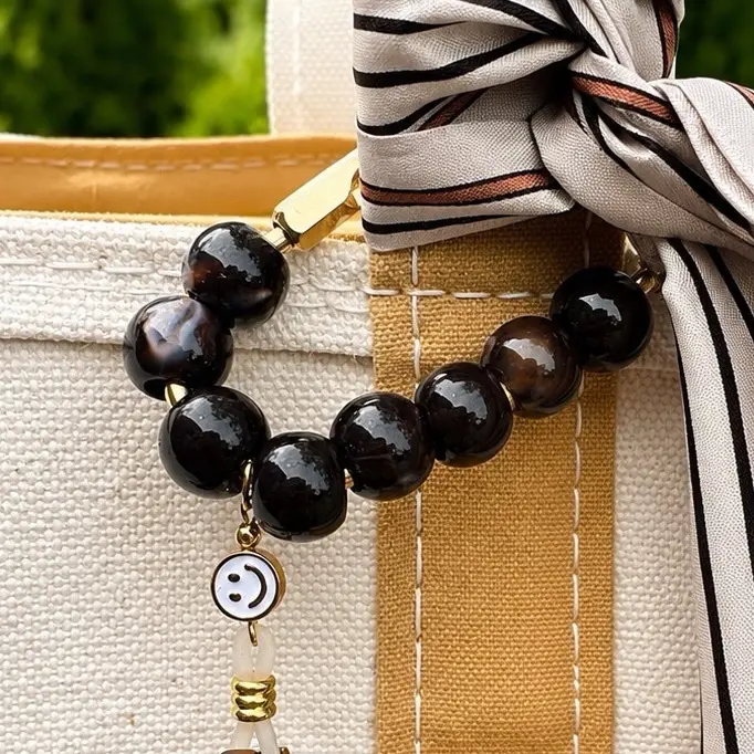 Espresso Smiley Bag Charm & Sunglass Holder
