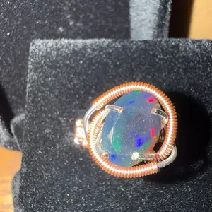 Black Opal Handmade Wire Wrapped Ring with Unique Design and Vibrant Colors