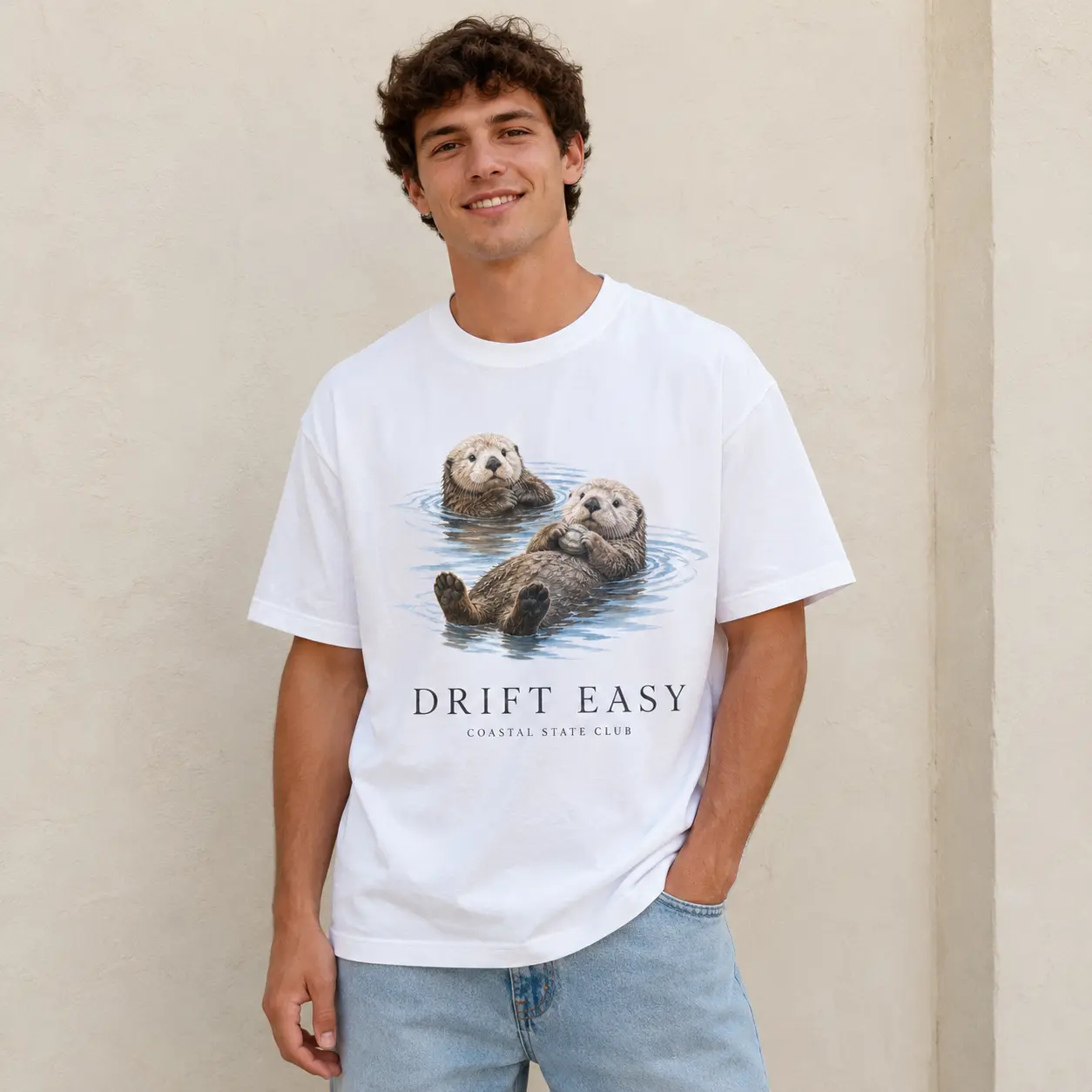 Men's Drift Easy Sea Otter Graphic T-Shirt, White Short Sleeve Crew Neck Tee, Cute Coastal Wildlife Print, Relaxed Ocean Streetwear Top, Casual Nature Lover Gift for Men
