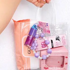 BOLSA COSMETICA TRASPARENTE CON ACCESORIOS INCLUIDOS