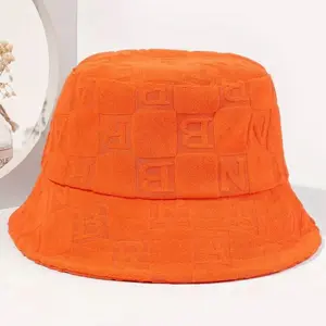 Chic Checkered Texture Bucket Hat in Vibrant Orange with Embossed Letters for Stylish Outfits