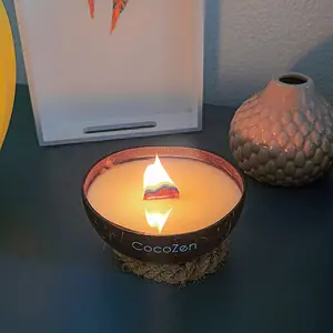 CocoZen.org's Non-Toxic all natural coconut shell candles - Snow-Kissed Pines Scent Candle - Winter wonderland dream, the fresh smell of pine trees and berries.