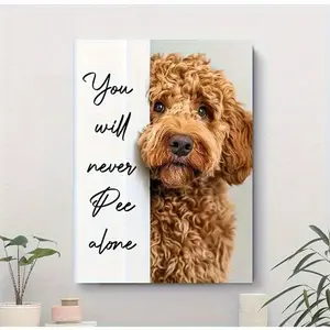 Framed canvas wall art, depicting a Golden Doodle dog with the humorous phrase "You'll never pee alone." This wooden framed animal poster is perfect for home decoration and is suitable for the living room, bathroom, and bedroom