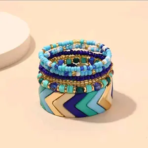 Womens Multicolor Bracelets - Colorful Beaded Design with Gold Accents and Chevron Pattern