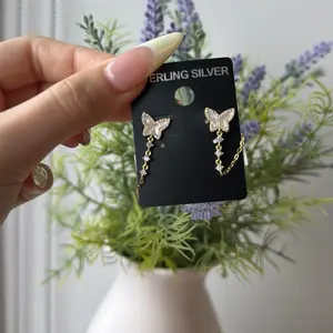 Aretes de mariposa blanca elaborados en plata 925