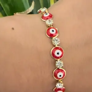 Red Evil Eye Bracelet with Gold Plating - 7 Inches Long