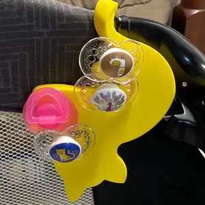 The Multiple Pacifier Holder, SnackTray and Teether.