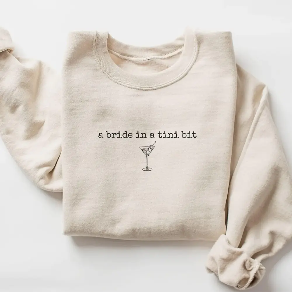 A Bride in a Tini Bit Bride Shirt, Espresso Martini Themed Future Mrs Tshirt, Tini Bit Engaged, Bridal Shower Gift Idea for Fiance Sweater, Crew Neck Graphic T-shirt Hoodie