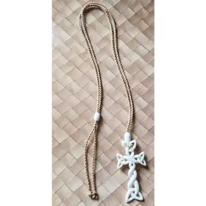 Twisted Bone Cross Necklace