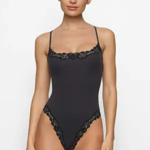 Black and white striped, detachable, body-hugging, and shaping garment