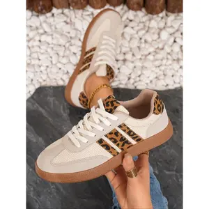 Women’s trendy leopard-print lace-up sneakers with panel design; comfortable, lightweight outdoor walking shoes; versatile fashionable athletic footwear for daily strolls and light sports; girls’ stylish casual trainers.