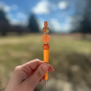 Orange Sparkles Stylish Pen with Orange Beads and Cap