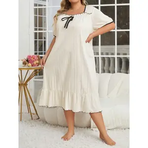 Plus-size sleepwear featuring a trim bow, bubble sleeves, ruffle hem, textured pattern—comfortable casual wear for nightdresses and loungewear