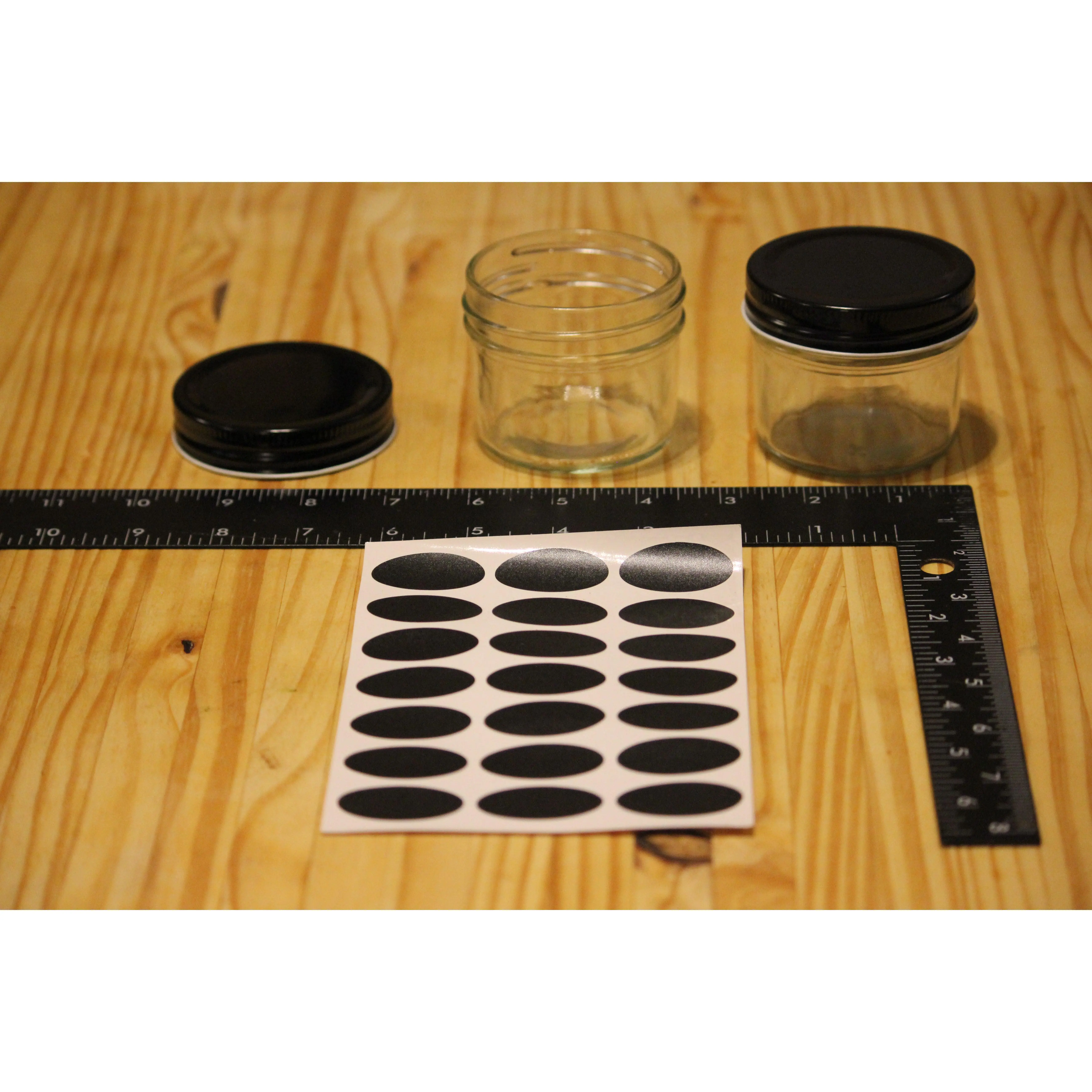 Set of 39 glass jars with lids- NEW IN BOX