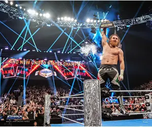 Sami Zayn WWE Unsigned Raising Title Photograph