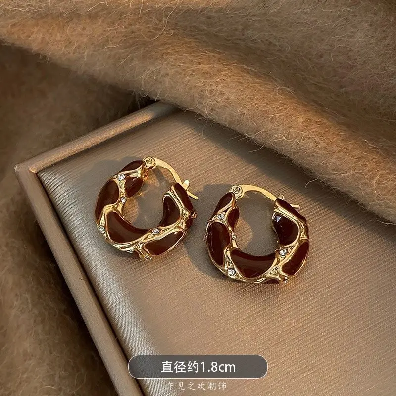 glazed zemald ear buckle