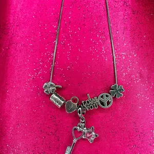Hadassah. Charm necklace meaning peace love & prosperity.