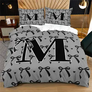 2/3-Piece Bedding Set: Black Bow & Letter Pattern Duvet Cover with Zipper Closure. Soft, breathable fabric, easy-care, ideal for bedroom decor.