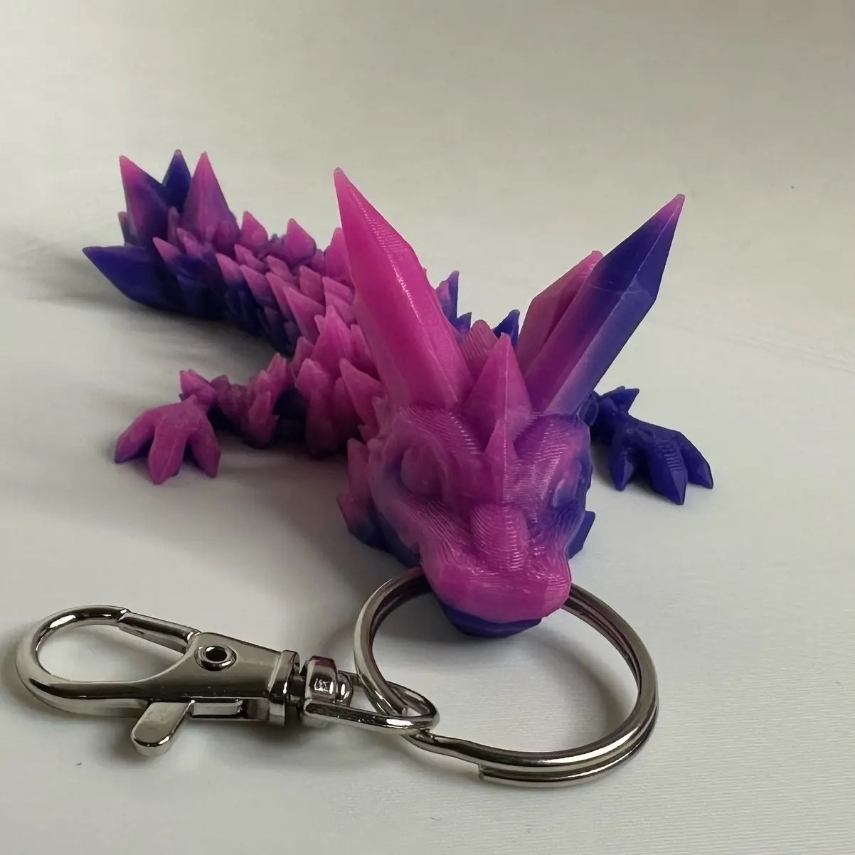 Crystal dragon keychain that changes color with temperature