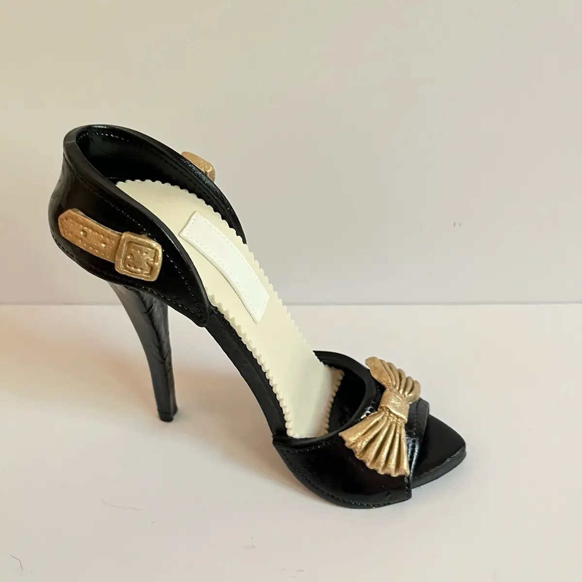 Black High Heel Cake topper Decoration with Gold Accents and Decorative Band