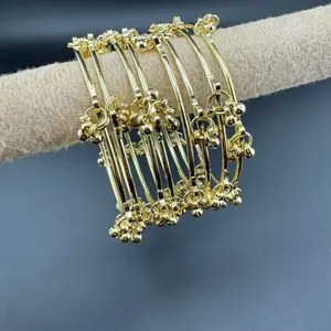 Kashmiri Ghunghru Bangles - Gold Tone 8 piece Kashmiri Ghunghru Bangles - Gold Tone 8 piece