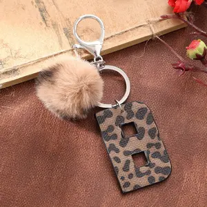 1pc Faux Leather Western-Inspired Leopard Print Soft Pompom Keychain with Initial Letters - Stylish Car & Bag Accessory Personalized Gift for Men