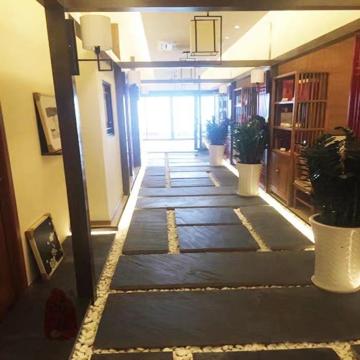 Natural black Natural Culture Stone Veneer slabs for outdoor gardens—stepping stones, egg-shaped decorative stones, pathway stones, and paving bricks