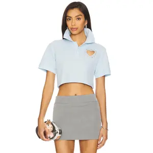 AREA Crystal Heart Cutout Cropped Polo Top in Baby Blue
