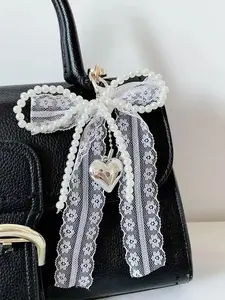 Fashionable and exquisite lace bow pendant, pearl heart-shaped pendant bag keychain pendant, sweet and cute accessories princess style, niche fashion all-match, ladies bag pendant jewelry, school bag pendant decoration, Charms for bags