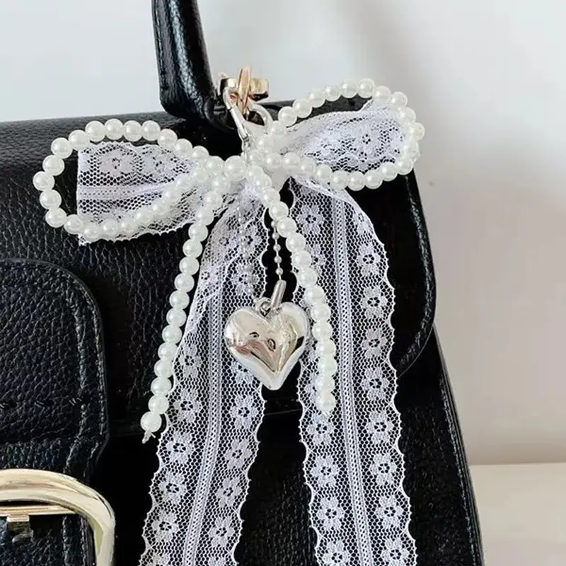 Fashionable and exquisite lace bow pendant, pearl heart-shaped pendant bag keychain pendant, sweet and cute accessories princess style, niche fashion all-match, ladies bag pendant jewelry, school bag pendant decoration, Bag Charm