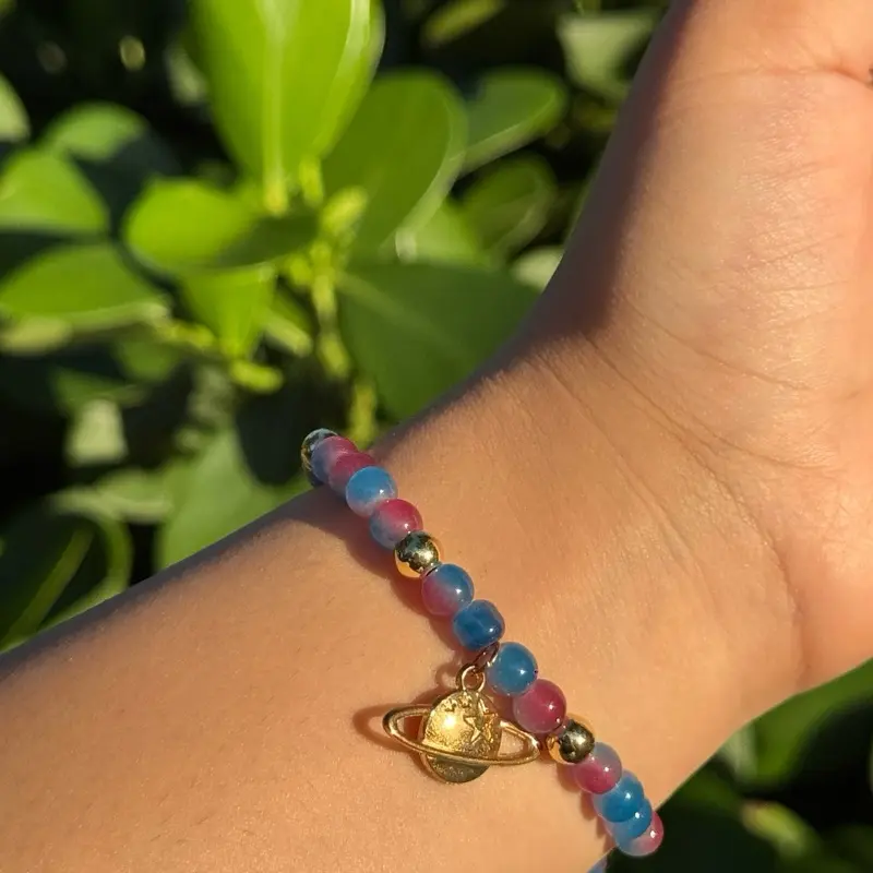 Saturn Charm Beaded Bracelet with Gold Accents & Red/Blue Galaxy Beads