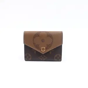 Pre-owned Louis Vuitton Coated Canvas Small Leather Goods Zoe Reverse Monogram Short Wallet T10387434