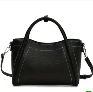 Elegant Black Handbag with White Stitching and Adjustable Strap for Versatile Use