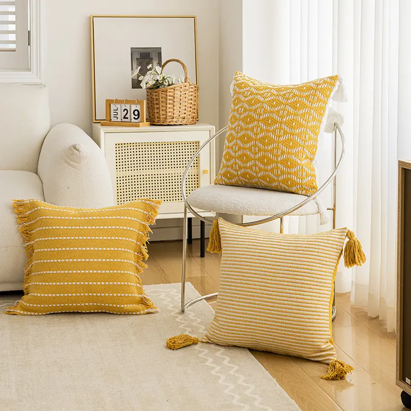 Yellow-toned striped throw pillow with tassels—versatile, stylish, and suitable for living room sofas, beds, and cars.
