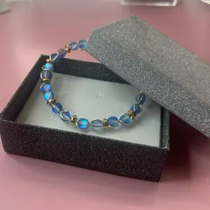 Mermaid Shimmer Bracelet with Blue Opal Beads and Gold Accents