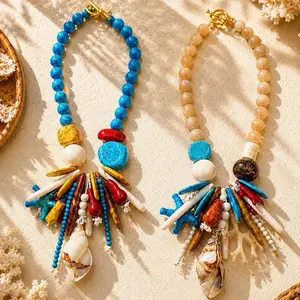 Maite Jewelry.                                                                   COLECCIÓN CORAL YCHSMPAGNE necklerces