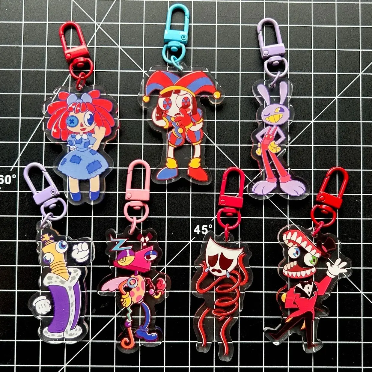 The Amazing Digital Circus Keychain(Pomni, Jax, Ragatha, Kinger, Zooble, Gangle, and Caine)