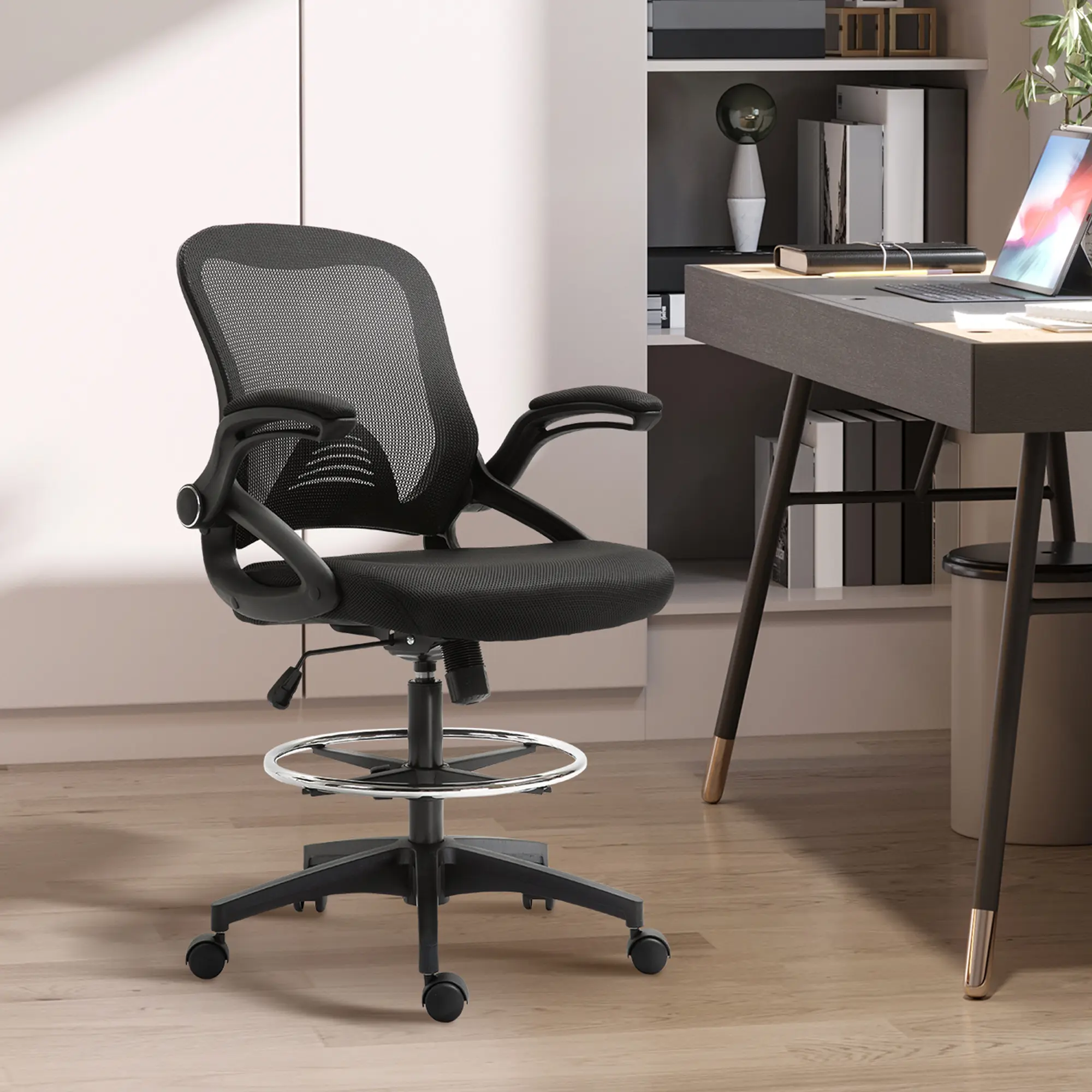 Mesh Drafting Chair – Black. Tall Design for High Desks. Adjustable Seat Height + Footrest Ring + Tilt Tension. Flip-Up Armrests. Breathable Mesh + Lumbar Support. 264 lbs Cap