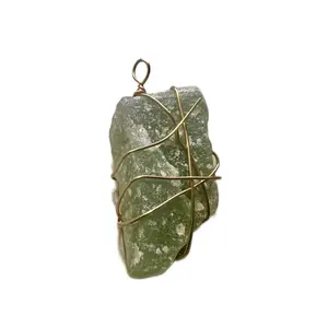 Wire wrapped hand panned crystal pendant