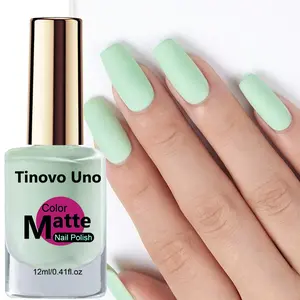Tinovo UnoMatte milky green nail polish with a velvety matte finish—say goodbye to greasy glossy finishes. Your fingertips will look as if they’ve been airbrushed with a high-end filter. Features a quick-drying, long-lasting formula that resists chipping.