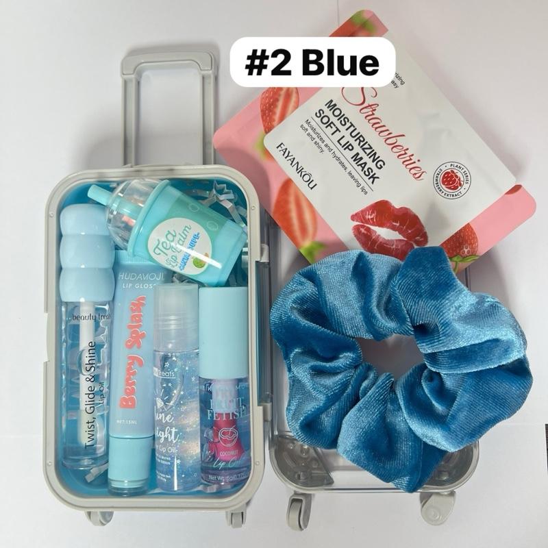 Mini Suitcase Lip Gloss Bundle ( lip oil, lip gloss, lip balm + scrunchie+ random hydrating lip mask)